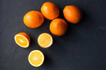 Fresh juicy oranges on wooden table