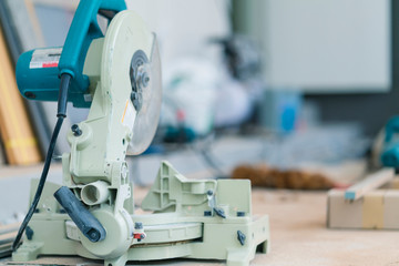 wooden carpenter with saw machine site construction ideas concept