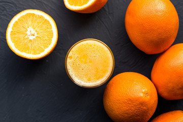 Fresh juicy oranges on wooden table