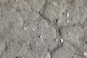 Texture of concrete. Asphalt background. Road surface. Texture of asphalt and stones on the road.