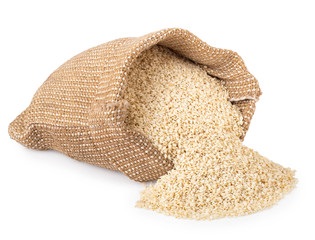 sesame seeds in burlap bag