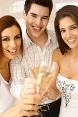 Closeup portrait of celebrating friends