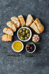 Italian food Cooking Italian bruschetta Olives fresh baguette slices olive oil garlic rosemary