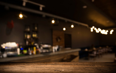 Beer barrel with beer glasses on a wooden table. The dark brown background.