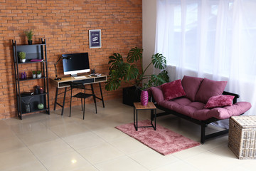Interior of room with comfortable workplace