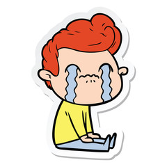sticker of a cartoon man crying