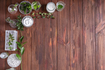 Ingredients for natural cosmetics on wooden table