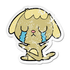 distressed sticker of a cute cartoon dog crying