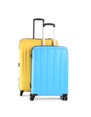 Packed suitcases on white background