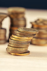 piles of coins on working table