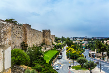 Fototapeta na wymiar The stone walls of Jerusalem