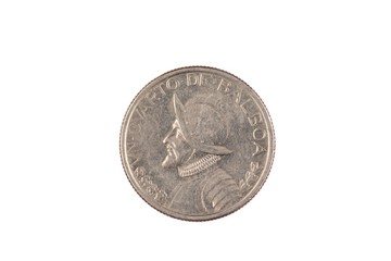 A close up image of a one quarter Balboa coin from Panama isolated on a white background