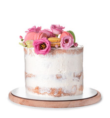 Sweet cake with floral decor on white background