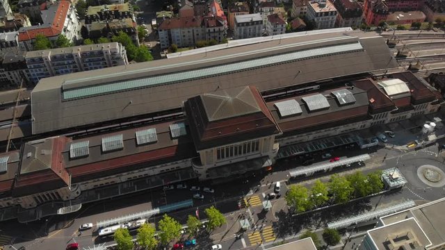 Aerial drone shot circling above Lausanne CFF train station
