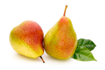 Fresh bio pear with leaves on isolated white background.