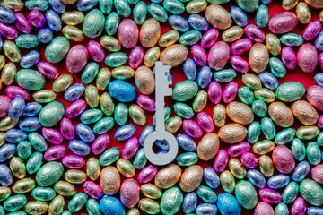 Fototapeta na wymiar color Chocolate Easter eggs and key.