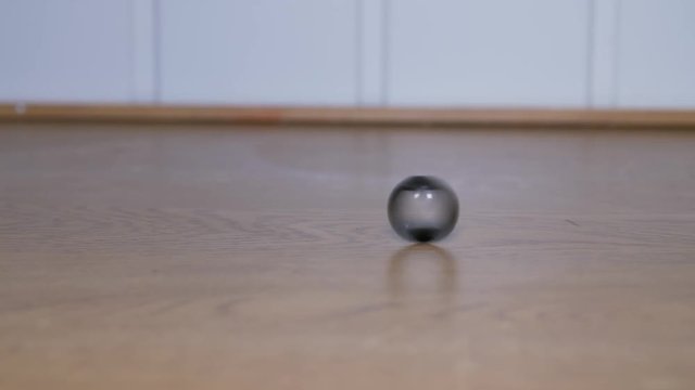 Closeup shot of a ring spinning on the table