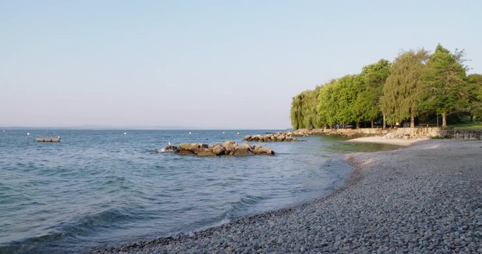 stony lakeshore in the morning