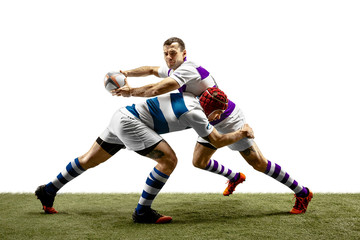 Naklejka na ściany i meble The silhouette of two caucasian rugby male players isolated on white background. Studio shot of fit men in motion or movement with ball. Jump and action concept. An incredible strain of all forces.