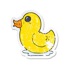 retro distressed sticker of a cartoon rubber duck
