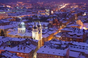 Dusk over Lvov in snow. View on the city from roof of the tower