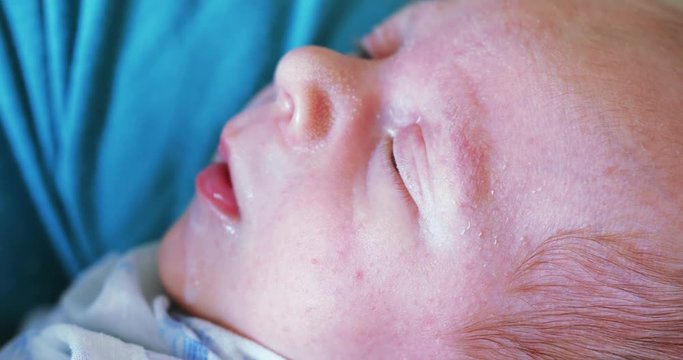 Artificial feeding of the child with a syringe