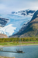 yacht, anchoring in front of Svartisen glacier, northern Norway, Scandinaviea © Uwe