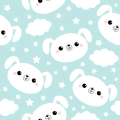 Seamless Pattern. White dog face. Cloud star in the sky. Cute cartoon kawaii funny smiling baby character. Wrapping paper, textile template. Nursery decoration. Blue background. Flat design