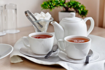 two cup of tea on table