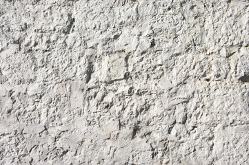Rough whitewashed limestone wall texture