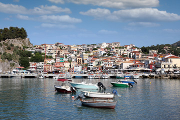 Fototapeta na wymiar colorful houses and boats Parga Greece in summer