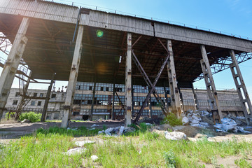 View of an abandoned factory, warehouse in an industrial area. Horizontal photography