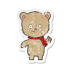 retro distressed sticker of a cartoon teddy bear waving