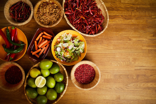 Top View Background Of Asian Food And Spices On Wooden Table, Copy Space