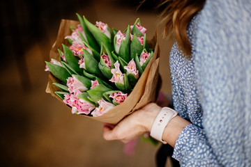 Bouquet of tulips in hands