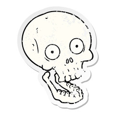 distressed sticker of a cartoon skull