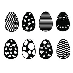 Eggs with cut patterns in black on white background.