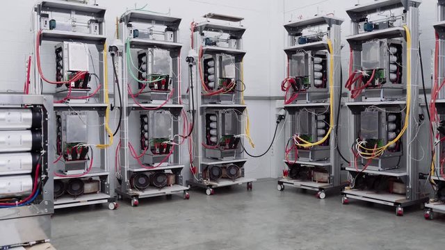 Test benches in the laboratory for the production of microprocessor-based protection and automation devices.