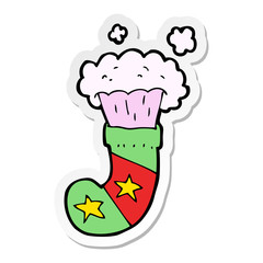 sticker of a cartoon magic christmas stocking