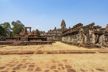 Cortyard of Bakong temple, Cambodia with ruins of hall and secondary tower