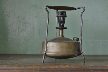 Old kerosene stove on the table.