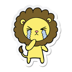 sticker of a cartoon crying lion