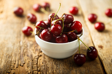 Fresh cherry in the white bowl