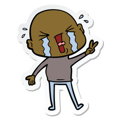 sticker of a cartoon crying bald man