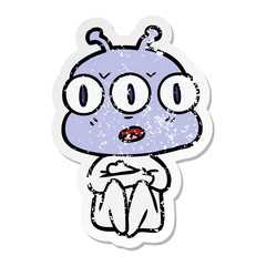 distressed sticker of a cartoon three eyed alien