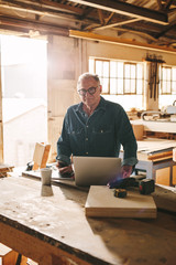 Senior man at his carpentry workshop