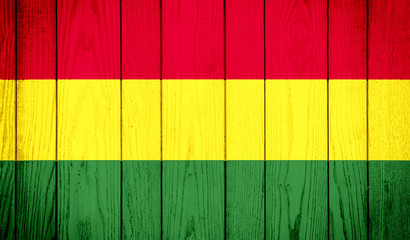 Flag of Bolivia on wooden background