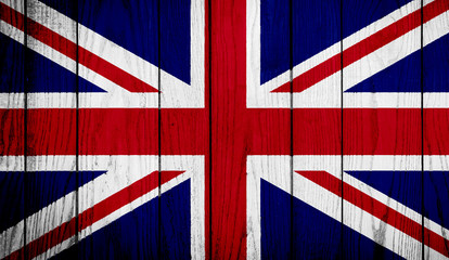 Fototapeta premium Flag of United Kingdom on wooden background