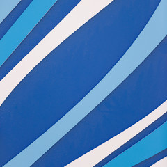 Сloseup of Multi-colored background of the wall in white, blue and blue. Plastic panels of different colors