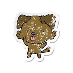 distressed sticker of a cartoon dog sticking out tongue